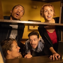 Escape room team photo with branded overlay