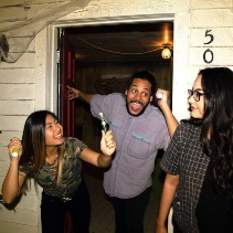 Group posing for a branded team photo